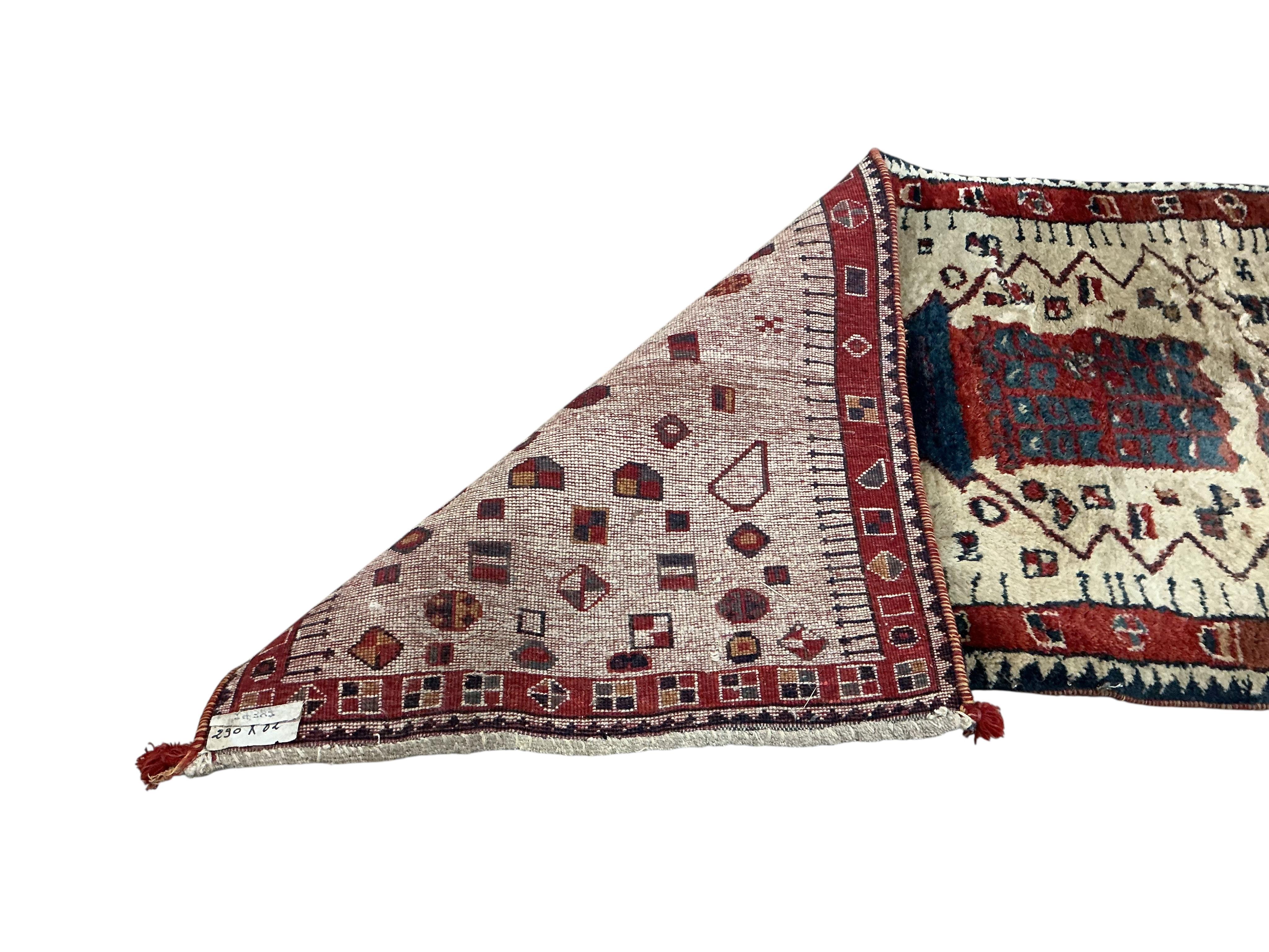 A Turkish runner, 292 x 82cm
